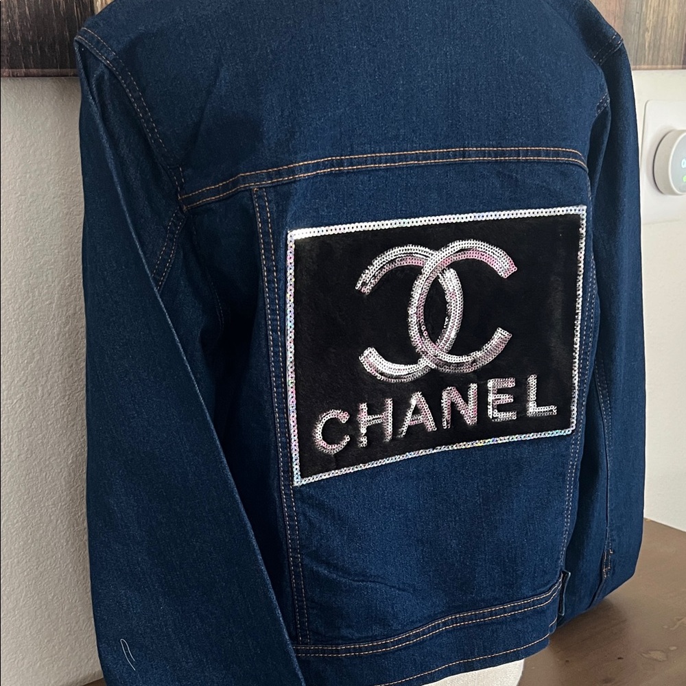 CHANEL Navy Denim Jacket with Black and Silver Logo